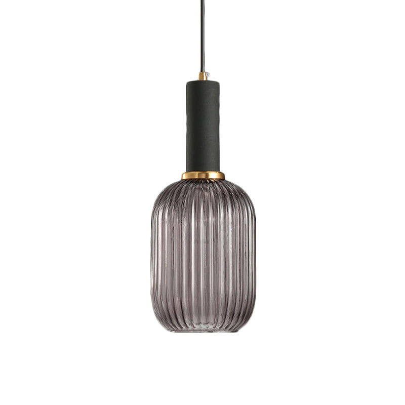 Tall smoke grey reeded glass shade from Clérachic with a black fitting, shown against a plain white backdrop.