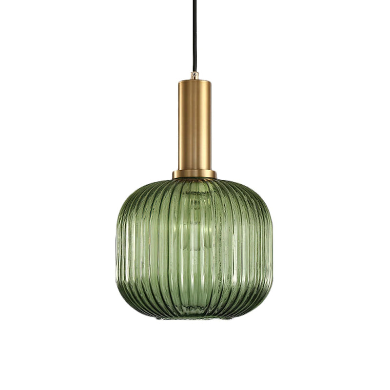 Rounded green reeded glass shade from Clérachic on a gold stem, shown against a plain white backdrop.