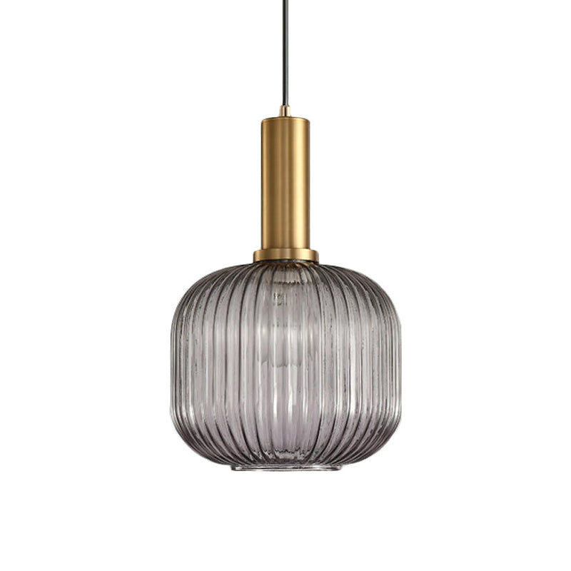 Rounded smoke grey reeded glass shade from Clérachic on a gold stem, shown against a plain white backdrop.