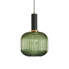 Rounded green reeded glass shade from Clérachic with a black fitting, shown against a plain white backdrop.