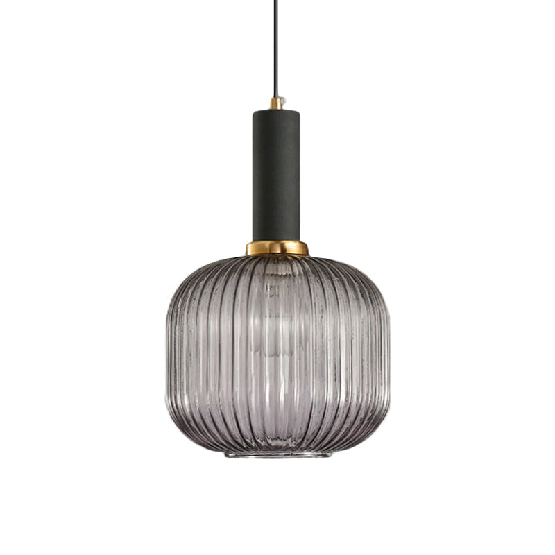 Rounded smoke grey reeded glass shade from Clérachic with a black fitting, shown against a plain white backdrop.