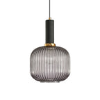 Rounded smoke grey reeded glass shade from Clérachic with a black fitting, shown against a plain white backdrop.