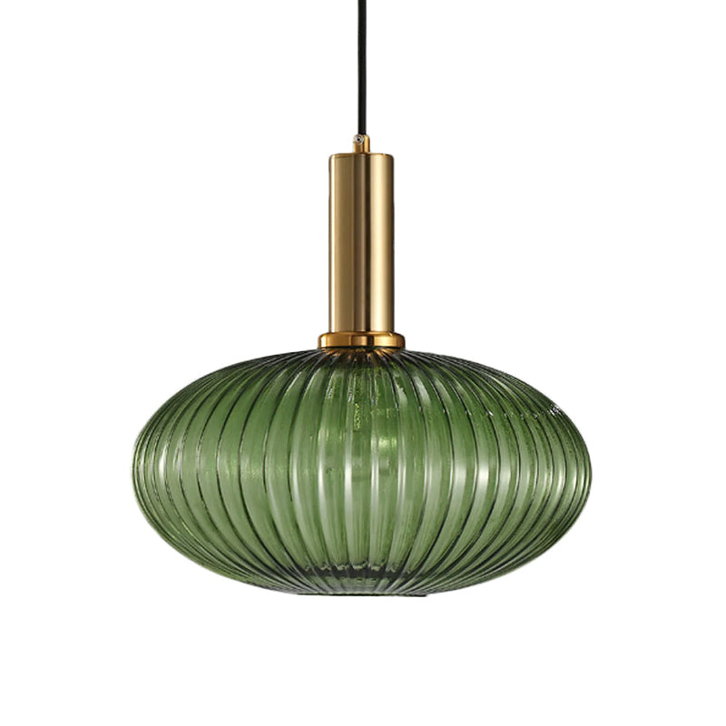 Flat, wide green reeded glass shade from Clérachic on a gold stem, shown against a plain white backdrop.
