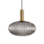Flat, wide smoke grey reeded glass shade from Clérachic on a gold stem, shown against a plain white backdrop.