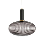 Flat, wide smoke grey reeded glass shade from Clérachic with a black fitting, shown against a plain white backdrop.