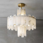 Clérachic Regina chandelier, tiered alabaster fins stepping down from a brushed brass canopy.