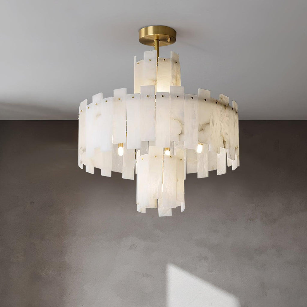 Clérachic Regina chandelier seen from below against grey, showing the stepped tiers of stone fins.