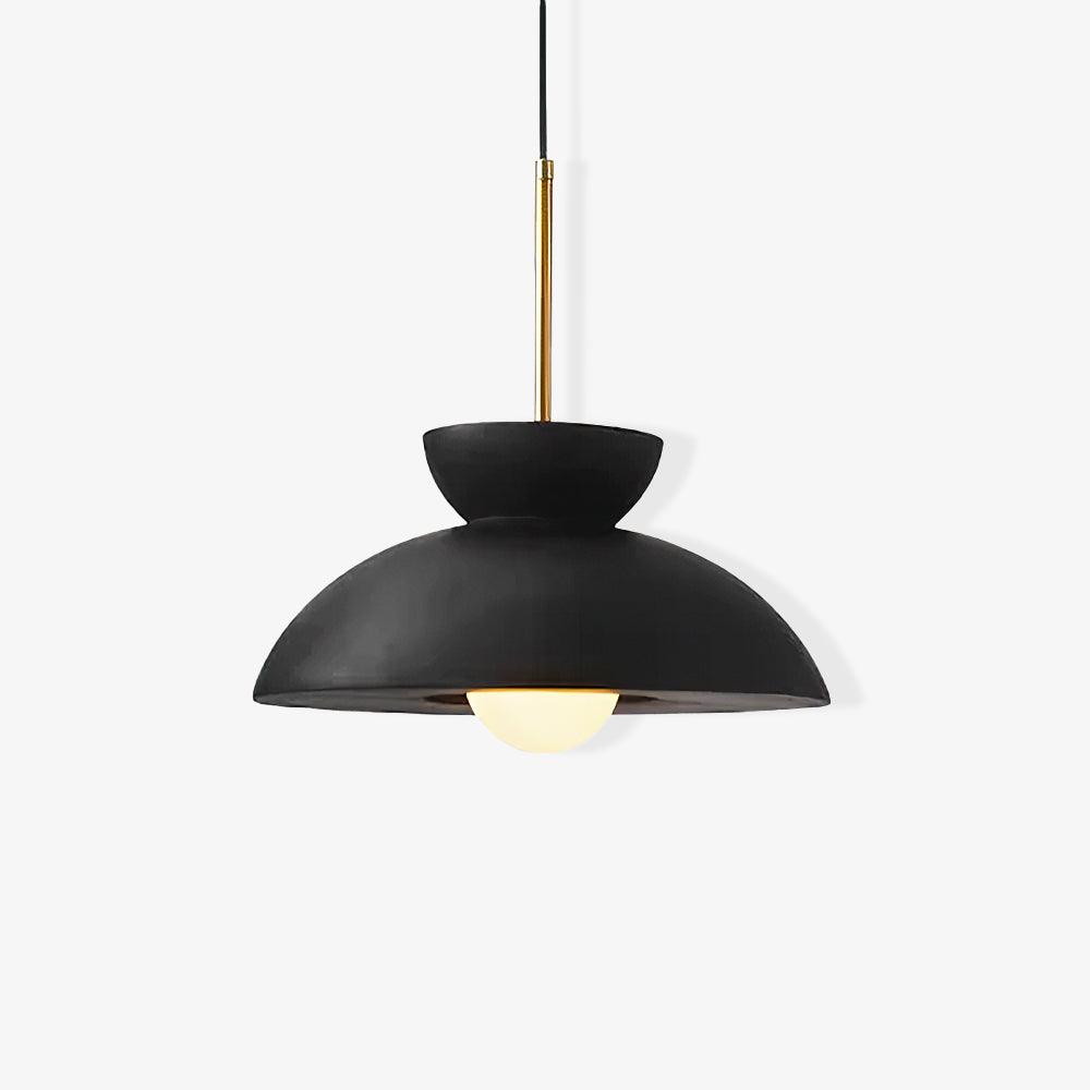Front view of this black Clérachic pendant on a white backdrop, with the brass stem and the round bulb under the dome.