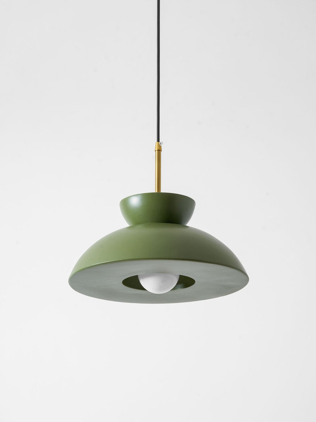 Underside of the green dome on this Clérachic pendant, where the round opal bulb sits in the centre opening.