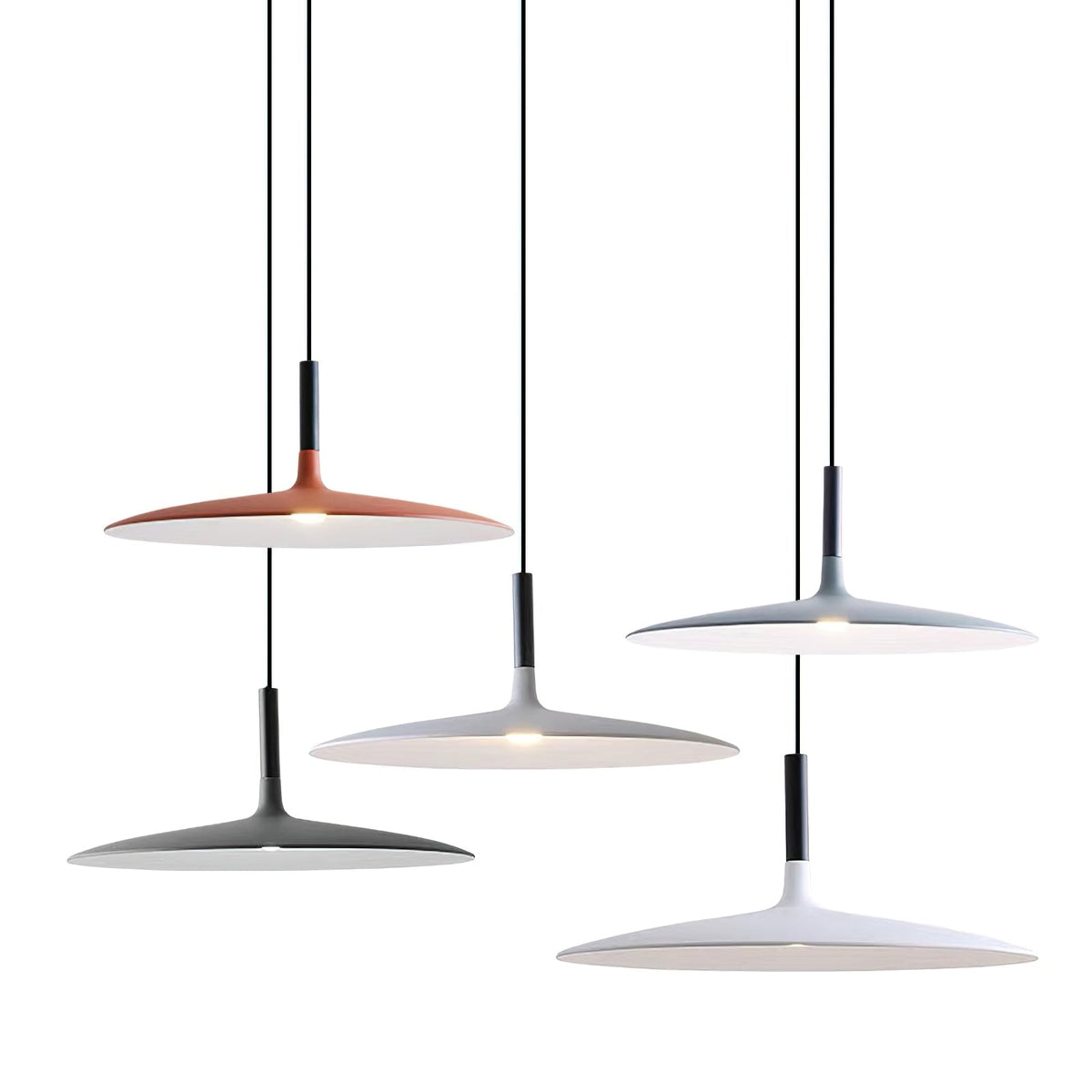 Six Clérachic pendants in orange, grey, black and white hung at different heights against a plain white backdrop.