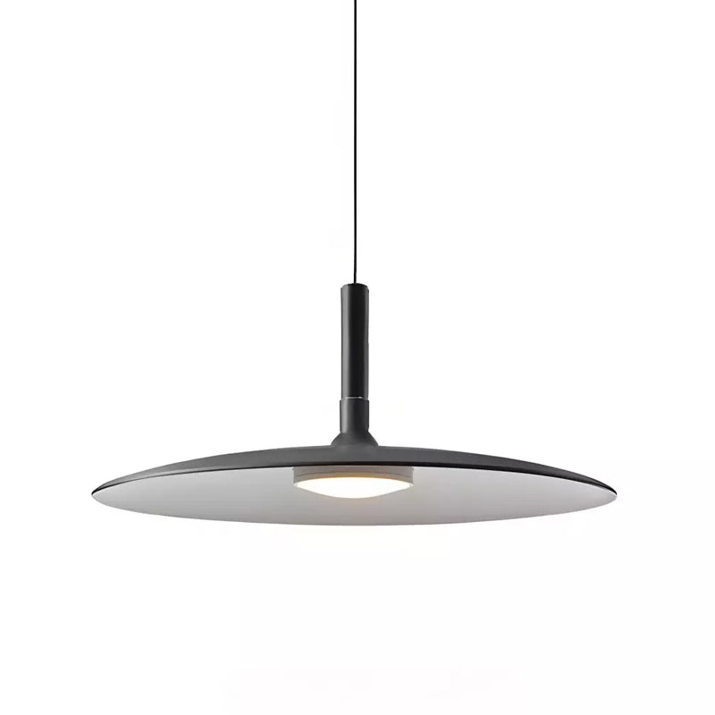 Matte black Clérachic pendant on a white background, with a pale underside and a round warm light below.
