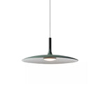 Smaller green Clérachic pendant on white, its wide disc shade with a lit round diffuser and a thin black cord.