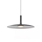 Large black Clérachic disc pendant on white, with a pale underside and a round warm light below the shade.