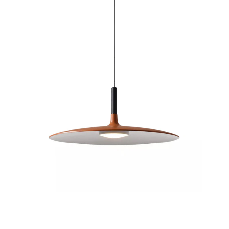 Small orange Clérachic pendant on a white background, its disc shade with a black stem and a round diffuser underneath.