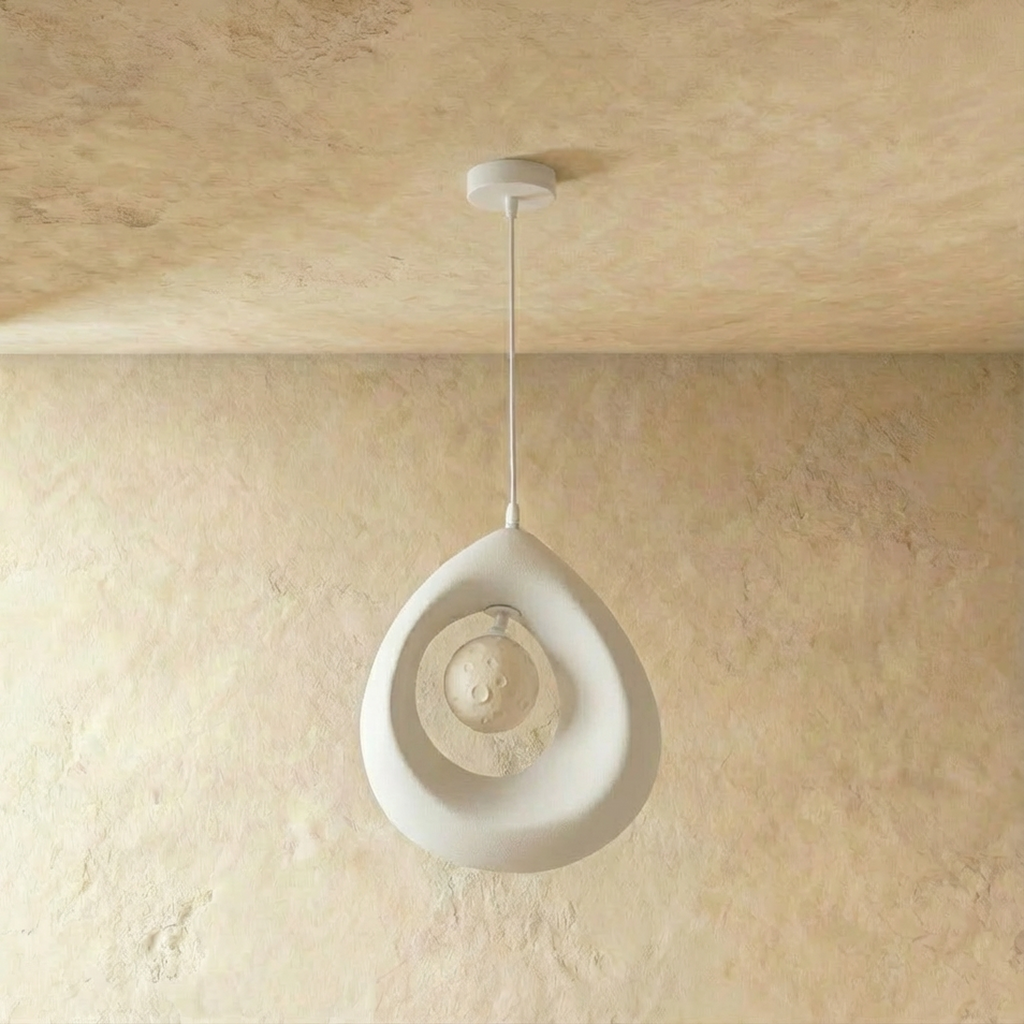 Clérachic white textured teardrop pendant with the crater-textured globe switched off inside its open ring, on a white cord.