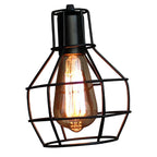 Close view of the Clérachic cage shade with a vintage-style filament bulb inside.