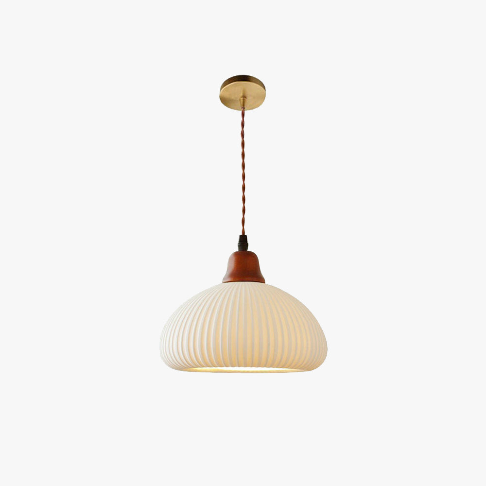 Clérachic Ribbed Ceramic Pendant Light shown alone against white: dome shade, turned wood holder and round brushed brass canopy.
