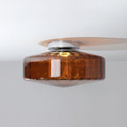 Brown ribbed glass Clérachic ceiling light with a chrome ceiling plate, its glass tapering to a point at the base.