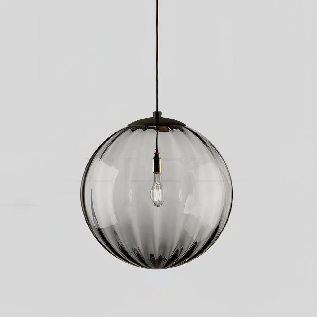 Smoke grey Clérachic glass pendant with a black cap, ribs running down the globe and a bulb inside.