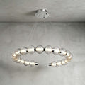 Horizontal open ring of ribbed glass beads with chrome end caps, hung from a round canopy on this Clérachic pendant.