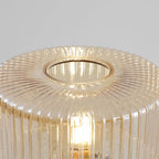 Close view of the fine vertical ribs and open top rim of the cognac glass shade on this Clérachic table lamp.