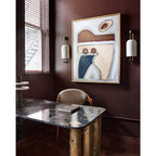 Clérachic wall light with a ribbed white shade on a deep burgundy wall, with a large abstract painting and a black marble desk below.