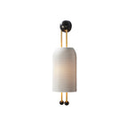 Side view of this Clérachic wall light with its ribbed white shade, gold-finish rods and black ball ends, cut out on white.