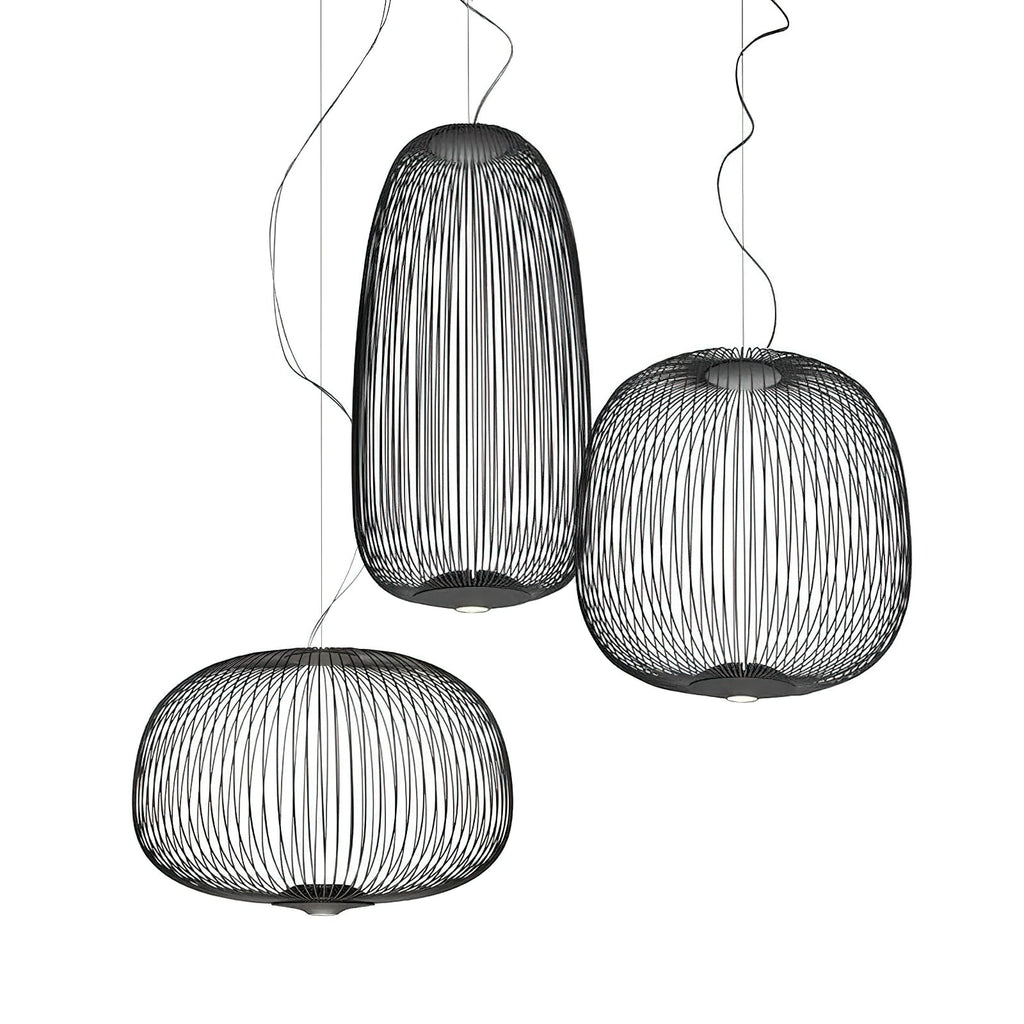 A line illustration of three Clérachic wire-cage pendants in different sizes hung together, in a tall oval, a dome and a low drum.