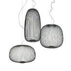 A line illustration of three Clérachic wire-cage pendants in different sizes hung together, in a tall oval, a dome and a low drum.
