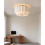 In a quiet room with a wooden desk, a monitor and a cup on a low table, this Clérachic ceiling light glows overhead.