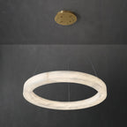 Clérachic chandelier in a large ring size, the alabaster glowing evenly the whole way round its circumference.