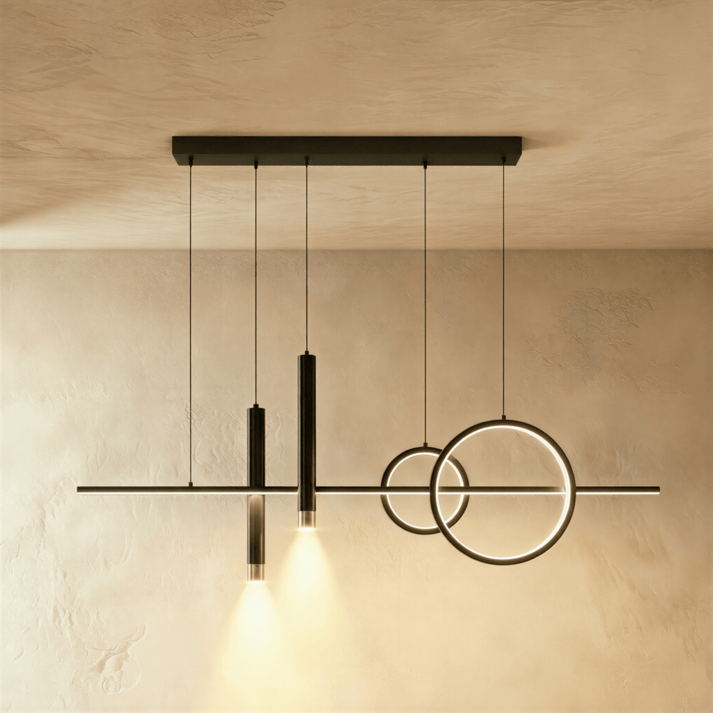 Clérachic all-black pendant light with a horizontal bar, two overlapping rings and two downlight tubes against limewash.