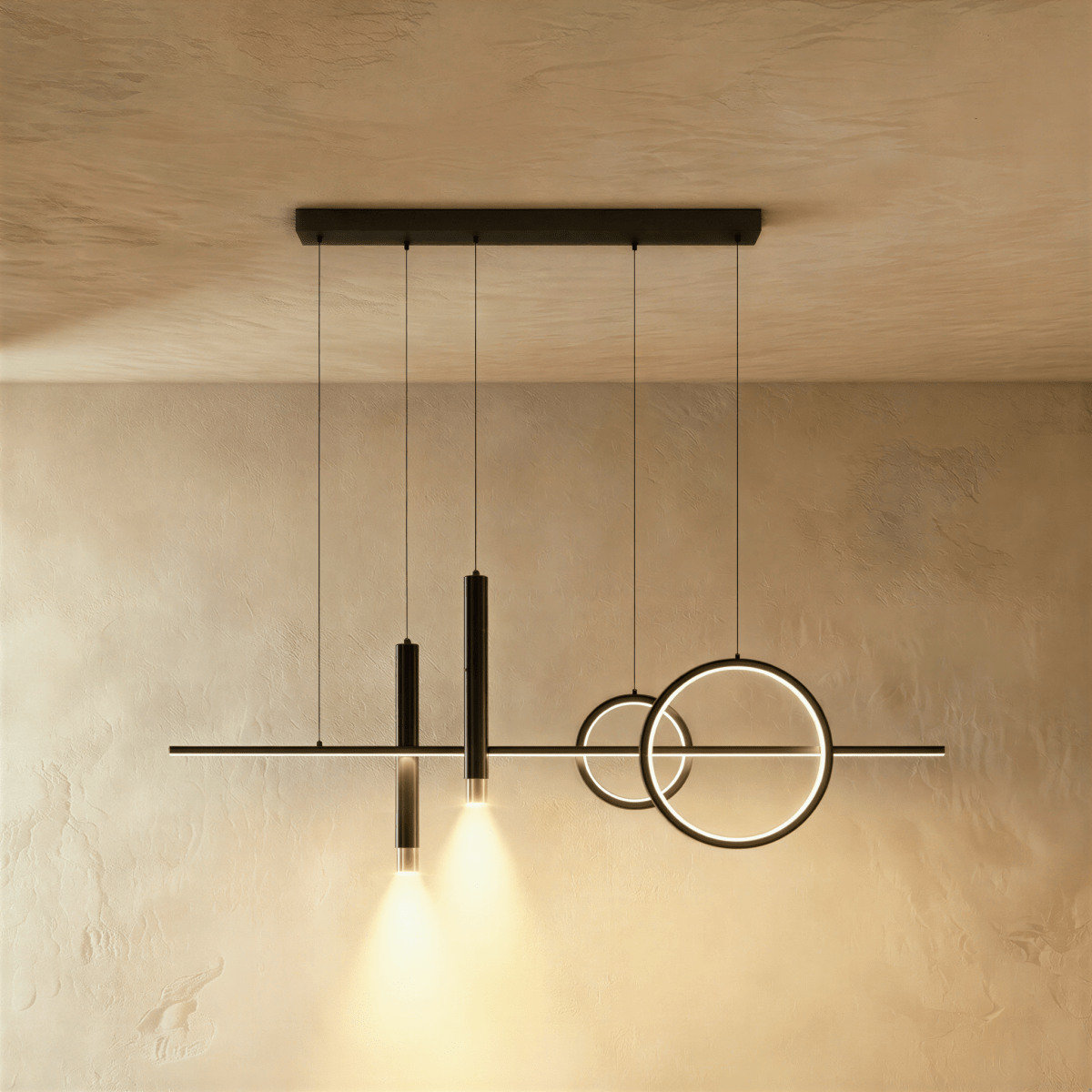 Clérachic black pendant light with a slim bar, two overlapping rings and two lit spot cylinders on a limewash wall.