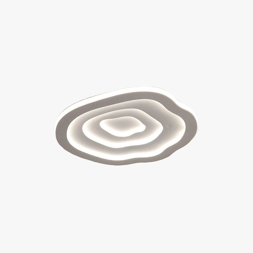 Clérachic Ripple Spiral flush mount on white, concentric acrylic bands in a soft cloud outline.