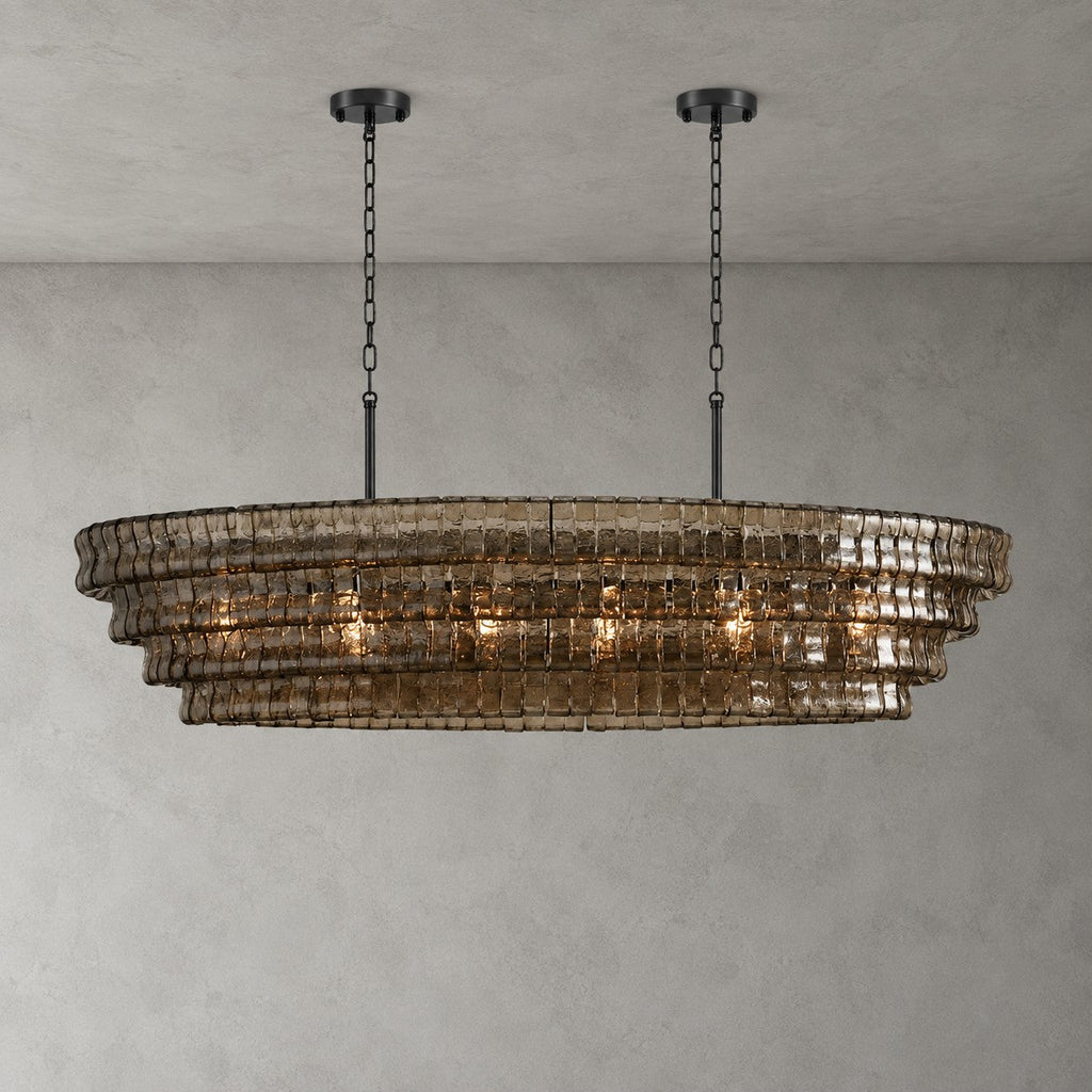 Smoke-grey glass on this four-tier Clérachic chandelier, hung from two black round canopies and black chains on grey.