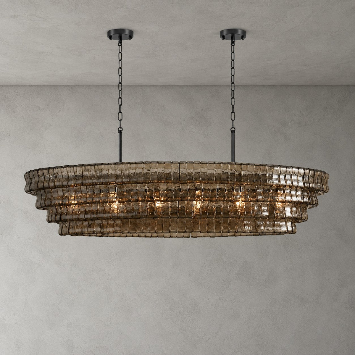 Smoke-grey glass on this four-tier Clérachic chandelier, hung from two black round canopies and black chains on grey.