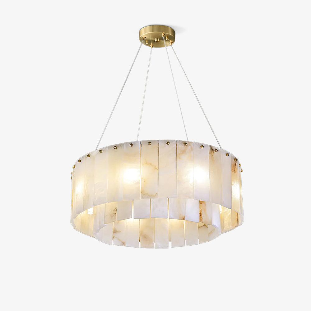 Clérachic Rock chandelier on white, hung on fine cables from a round brass canopy.