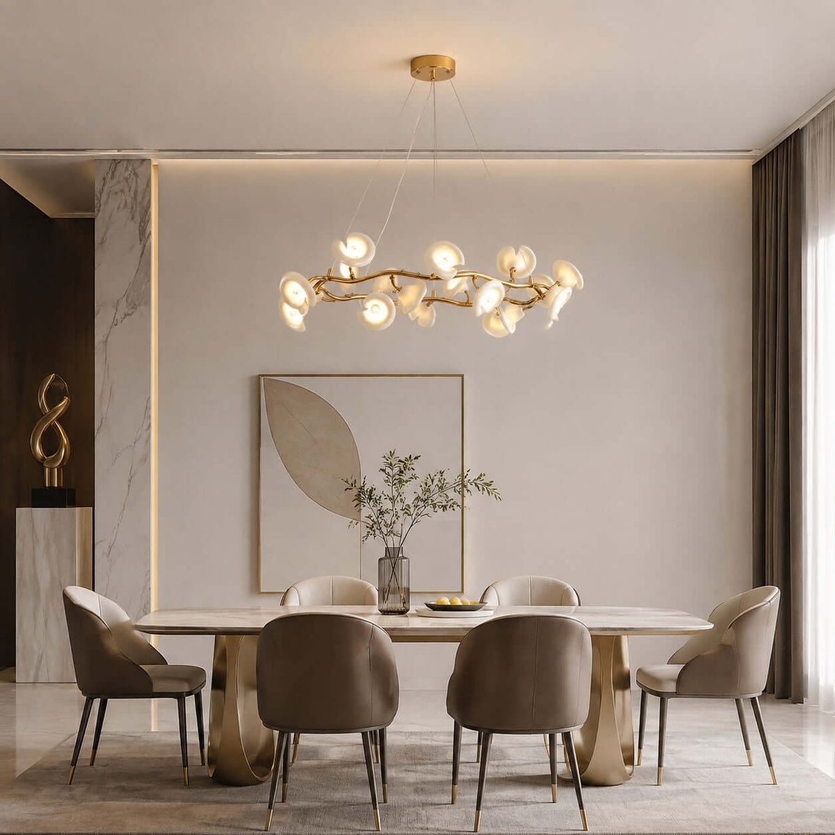 Round Clérachic chandelier with lit white ceramic petals above a dining table with brown chairs and a leaf-shaped wall panel.