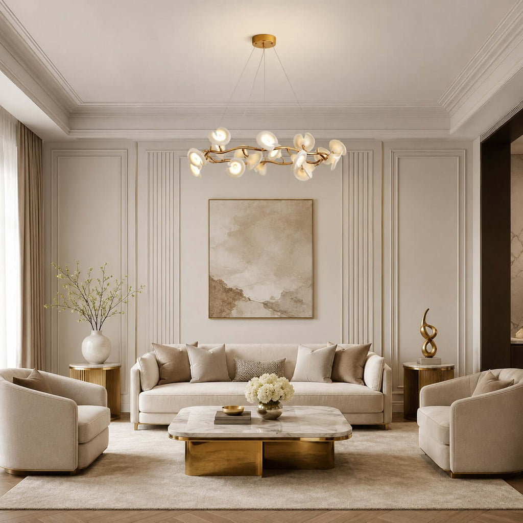 A round ceramic petal Clérachic chandelier hangs in a panelled living room with a cream sofa, two armchairs and a gold side table.