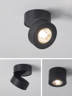 Black Clérachic spotlight tilted towards the viewer, with two smaller inset views below showing it angled sideways and sitting flat.