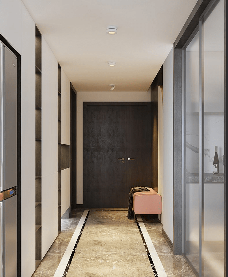 White Clérachic spotlights on the ceiling of a long hallway with a polished stone floor, dark double doors and a pink bench at the end.