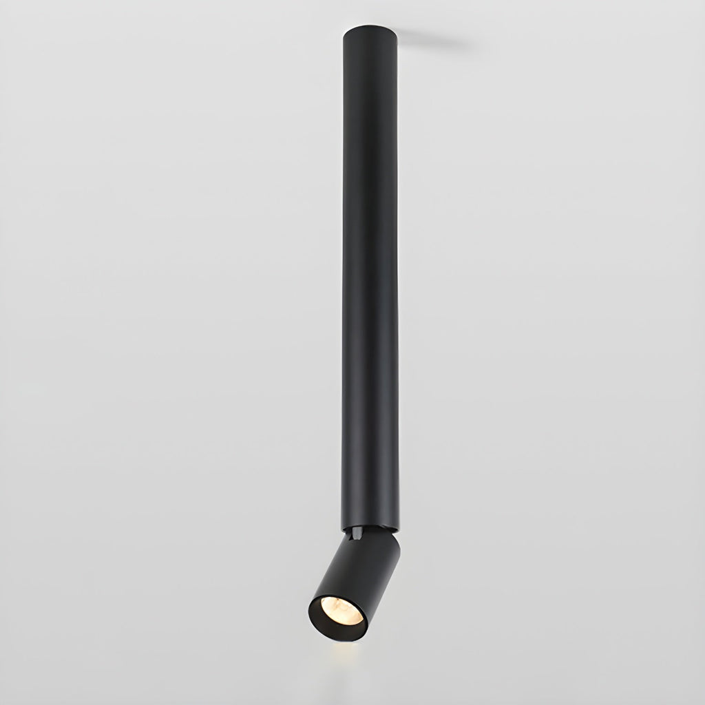 A long black Clérachic spotlight pole with a small angled head at its lower end, on a pale backdrop.
