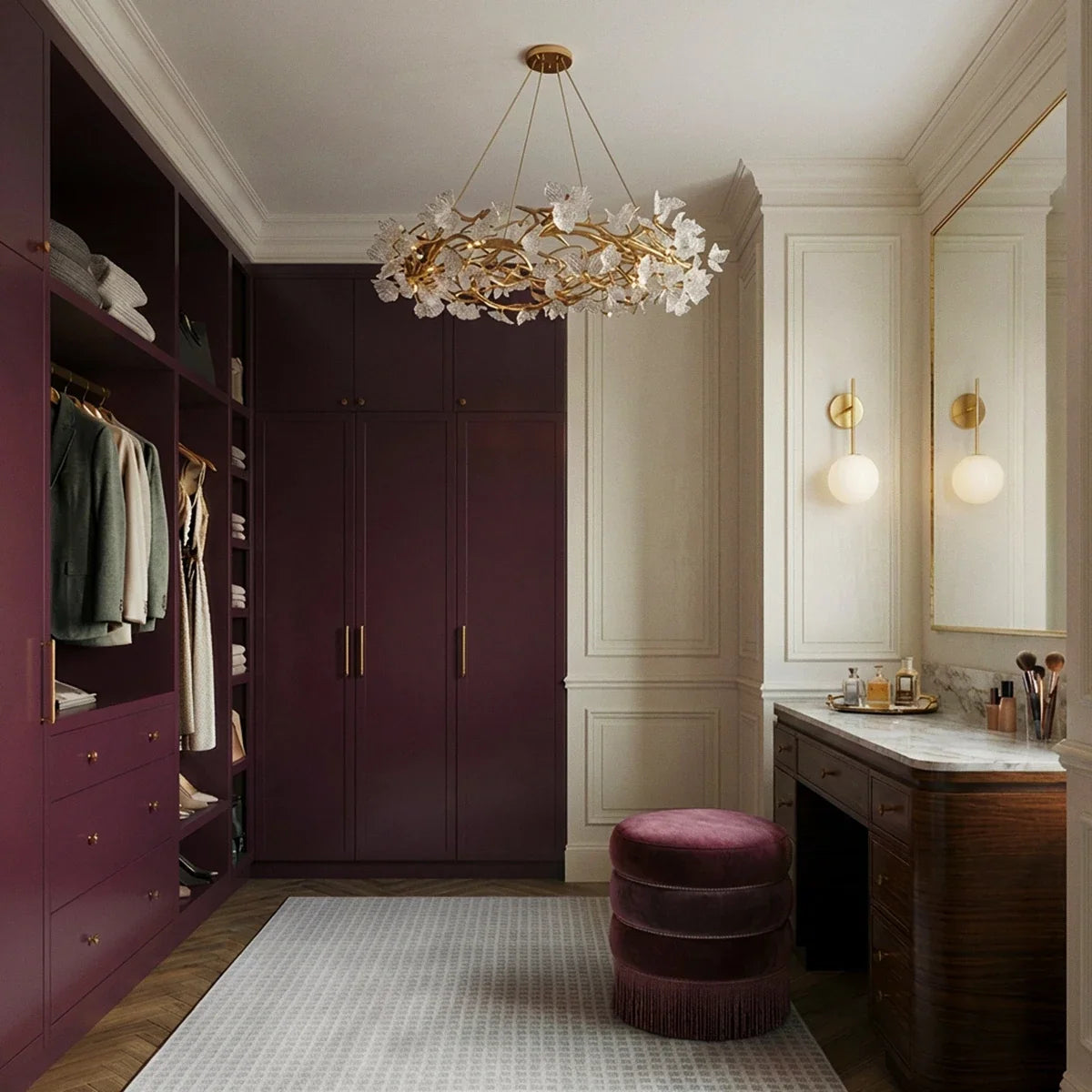 Clérachic round chandelier hanging in a dressing room with plum wardrobes, a velvet pouf and two globe wall lights.