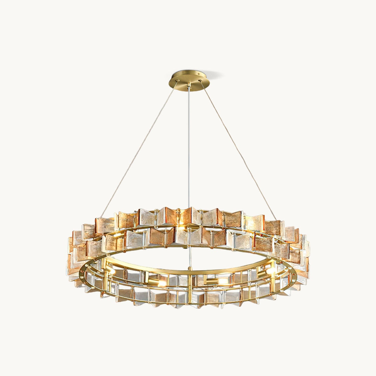 This Clérachic chandelier in amber on a plain white backdrop, a slim round brass-finish ring hung on fine wires, with two tiers of ribbed glass blades.