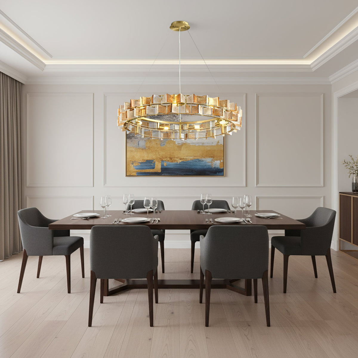 In a modern dining room with pale panelled walls and grey chairs, an amber Clérachic chandelier hangs low over a long wooden table.