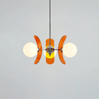 Clérachic three-globe chandelier with curved orange acrylic petals and white glass balls on a chrome hub