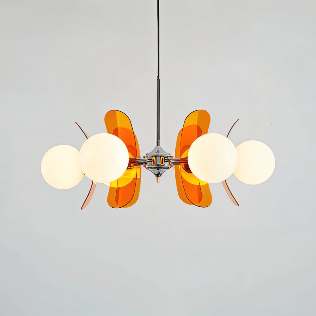 Clérachic chandelier with opal globes and glowing orange acrylic petals fanned out from a chrome hub