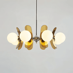 Clérachic eight-light chandelier with white globes and layered brown acrylic petals on a chrome hub