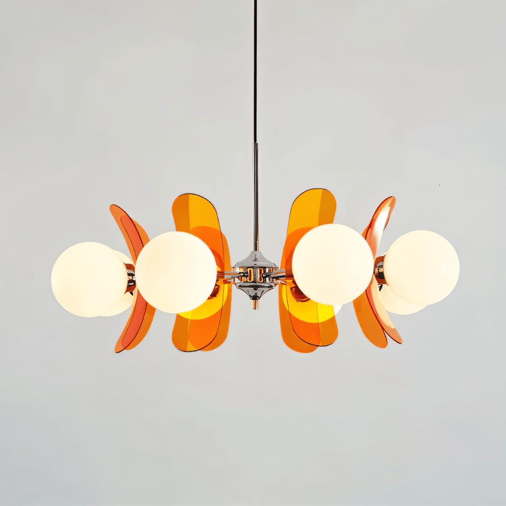 Clérachic eight-light chandelier with white globes and layered orange acrylic petals on a chrome hub