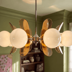 Clérachic chandelier seen from below, opal globes and brown acrylic petals on a polished chrome hub